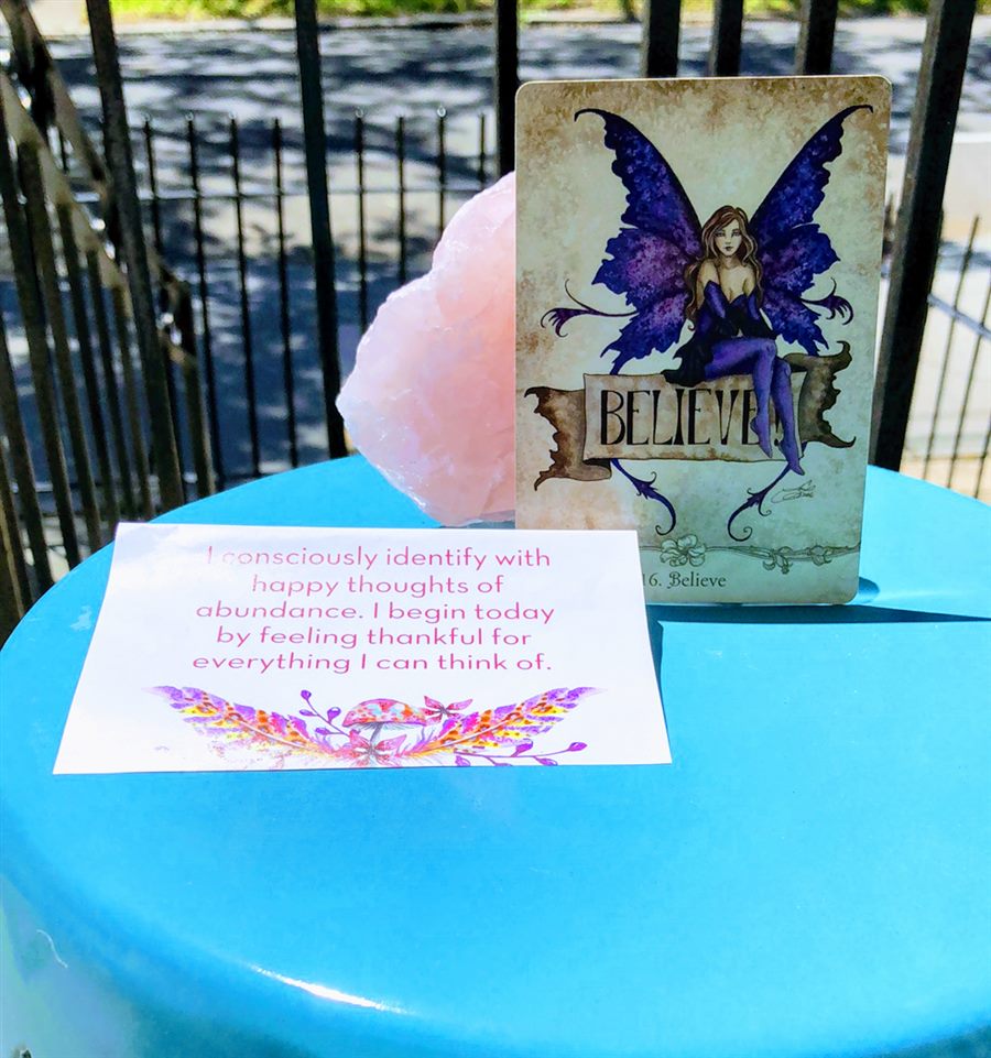 Believe oracle card with rose quartz and daily affirmation
